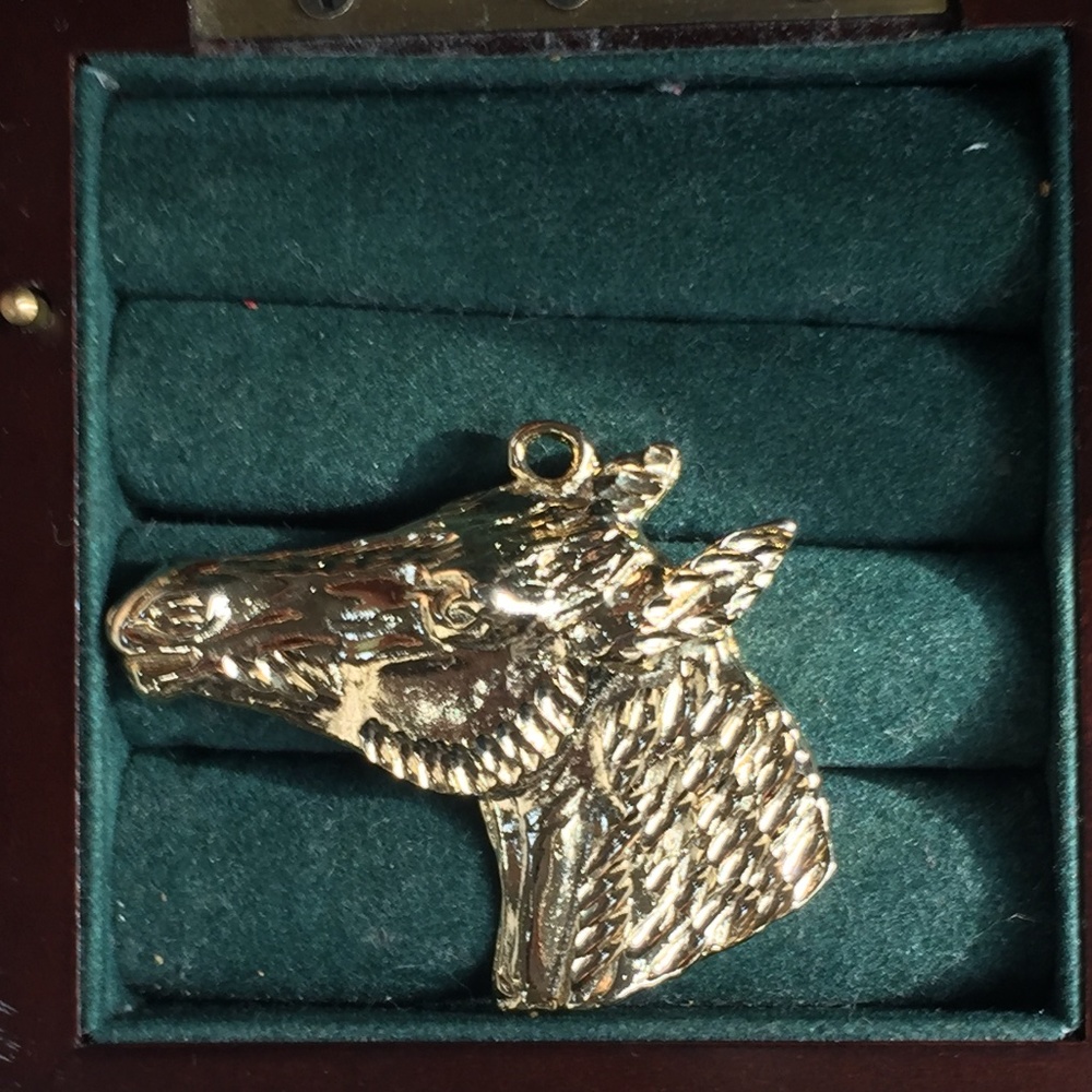Gold stallion pendant
